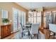 Bright breakfast nook with a round table and chairs, perfect for enjoying meals at 4993 Sedona Cir, Parker, CO 80134