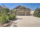 Two-story house with stone and siding, two-car garage, and landscaping at 4993 Sedona Cir, Parker, CO 80134