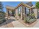 Landscaped front yard with stone pathway and flowerbeds at 4993 Sedona Cir, Parker, CO 80134