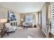 Comfortable living room featuring a neutral color palette and large windows at 4993 Sedona Cir, Parker, CO 80134