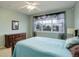 Bedroom with ceiling fan and window coverings at 8865 Federal Blvd # 201, Westminster, CO 80260