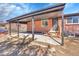 Backyard patio featuring a covered sitting area at 3272 W Stanford W Ave, Englewood, CO 80110