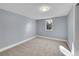 Finished basement bedroom with plush carpeting and natural light at 3272 W Stanford W Ave, Englewood, CO 80110