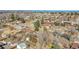 Aerial view of a quiet residential neighborhood with mature trees at 3272 W Stanford W Ave, Englewood, CO 80110