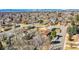 Aerial view of a quiet residential neighborhood with mountain views at 3272 W Stanford W Ave, Englewood, CO 80110