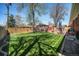 Sprawling backyard with lush green grass, a patio area, gazebo and privacy fencing at 7071 Beach St, Westminster, CO 80030