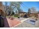 Large backyard featuring a brick patio, a fire pit, a gazebo and ample space for outdoor enjoyment at 7071 Beach St, Westminster, CO 80030