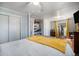 Spacious bedroom with hardwood floors, good natural light, and ample closet space for storage at 7071 Beach St, Westminster, CO 80030