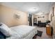 Relaxing bedroom with a comfortable bed, workspace, and ambient lighting creates a peaceful environment at 7071 Beach St, Westminster, CO 80030
