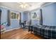 Comfortable bedroom with natural light, hardwood floors, and neutral colors offers a relaxing retreat at 7071 Beach St, Westminster, CO 80030