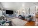 Inviting living room features hardwood floors and modern decor at 7071 Beach St, Westminster, CO 80030