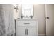 Bathroom with white vanity, modern fixtures, and a bright, clean aesthetic at 17657 E Prentice Cir, Aurora, CO 80015