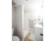 Bathroom with white vanity, modern fixtures, and tiled shower at 17657 E Prentice Cir, Aurora, CO 80015