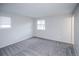 Neutral bedroom features plush carpeting, a double window, and ample natural light at 17657 E Prentice Cir, Aurora, CO 80015