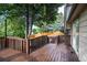 Exterior view of a wooden deck with a lattice railing, adjacent to the home and overlooking the backyard at 17657 E Prentice Cir, Aurora, CO 80015