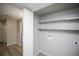 Laundry room featuring white walls, shelving, and washer/dryer hookups at 17657 E Prentice Cir, Aurora, CO 80015