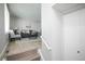 Bright living room with new floors and staircase at 17657 E Prentice Cir, Aurora, CO 80015