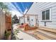 Charming backyard featuring raised garden beds and a tranquil, well-maintained outdoor space at 935 Newark St, Aurora, CO 80010