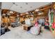 Finished garage with motorcycle, tool chests, couch, and storage at 935 Newark St, Aurora, CO 80010