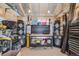 Well organized shed with tool chests, speakers, and a workspace on wheels at 935 Newark St, Aurora, CO 80010