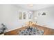 Bright office space featuring hardwood floors, natural light, and a modern desk at 1180 S Honey Way, Denver, CO 80224