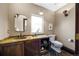 Elegant bathroom featuring custom vanity, granite counters, and modern fixtures providing a spa-like experience at 229 Albion St, Denver, CO 80220