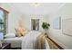 Bedroom with hardwood floors, warm lighting, and cozy accents, offering a relaxing atmosphere at 229 Albion St, Denver, CO 80220