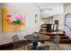 Cozy dining area adjacent to the kitchen with modern decor and warm lighting at 229 Albion St, Denver, CO 80220