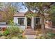 Beautiful home with a red tile roof, landscaped front yard, and charming curb appeal at 229 Albion St, Denver, CO 80220