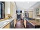 Open kitchen featuring stainless appliances, granite counters, and hardwood floors at 229 Albion St, Denver, CO 80220