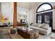 Spacious living room with views into the kitchen, plus an open floor plan and modern decor at 229 Albion St, Denver, CO 80220