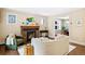 Cozy living room with fireplace, hardwood floors, and lots of natural light at 229 Albion St, Denver, CO 80220