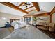 Spacious main bedroom with vaulted ceiling, wood beams, and private patio access at 229 Albion St, Denver, CO 80220