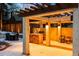 Outdoor kitchen with grill and dining area under pergola, perfect for entertaining in all seasons at 229 Albion St, Denver, CO 80220