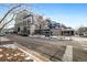 Street view of a mixed-use commercial building at 229 Albion St, Denver, CO 80220