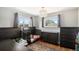 bedroom with hardwood floors, neutral walls, and natural light, creating a relaxing retreat at 6676 S Kit Carson St, Centennial, CO 80121