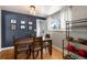 Charming dining room with a rustic wooden table, perfect for Gathering meals and entertaining guests at 6676 S Kit Carson St, Centennial, CO 80121