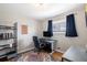 Functional office with hardwood floors, neutral walls, and natural light, creating a great work space at 6676 S Kit Carson St, Centennial, CO 80121