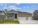 Charming single-story home featuring stone accents and a convenient two-car garage at 1144 Ridgefield Dr, Berthoud, CO 80513