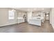 Beautiful bright kitchen boasts stainless steel appliances, island, and ample countertop space at 1144 Ridgefield Dr, Berthoud, CO 80513