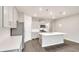 Stylish kitchen featuring an island, stainless steel appliances, and ample cabinet space at 1144 Ridgefield Dr, Berthoud, CO 80513