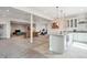 Finished basement with a wet bar, pool table, entertainment area, and exercise equipment at 16272 W 95Th Ln, Arvada, CO 80007