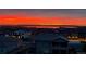 Breathtaking sunset view over the city and lake at 16272 W 95Th Ln, Arvada, CO 80007