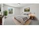 Bright bedroom featuring a comfortable bed, neutral tones, and a large window that fills the space with natural light at 6330 E Irwin Pl, Centennial, CO 80112