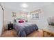 Cozy bedroom with neutral decor and ample closet space at 1859 S Saulsbury Ct, Lakewood, CO 80232