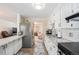 Modern kitchen with granite countertops and stainless steel appliances at 1859 S Saulsbury Ct, Lakewood, CO 80232