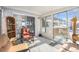 Relaxing sunroom with plenty of natural light and comfortable seating at 1859 S Saulsbury Ct, Lakewood, CO 80232