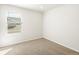 Bedroom showcasing neutral carpet, blinds, and natural light at 22360 E 8Th Ave, Aurora, CO 80018