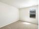 Bedroom featuring neutral carpet and natural light at 22360 E 8Th Ave, Aurora, CO 80018