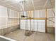 Spacious garage featuring white door and drywall at 22360 E 8Th Ave, Aurora, CO 80018